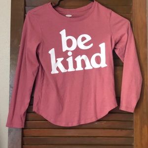 A pink shirt be kind